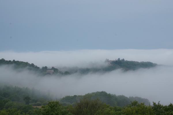 Mist-filled valley, Umbria.